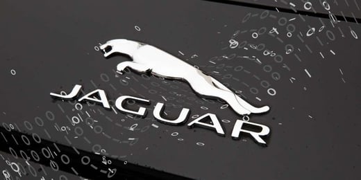 Jaguar logo with digital binary overlay symbolising automotive innovation and AI-powered vehicle technology.