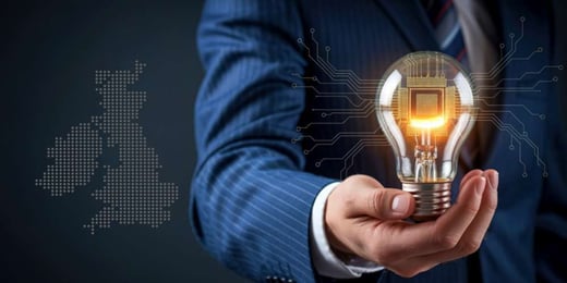 Business leader holding a glowing AI-powered lightbulb, symbolising innovation, artificial intelligence, and UK digital strategy.